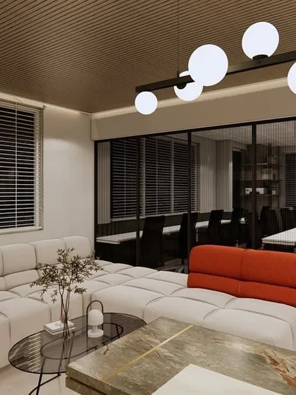 This render shows the informal lounge area of the Dubai office, demonstrating how a pop of color can make a corporate space feel more vibrant and inviting.