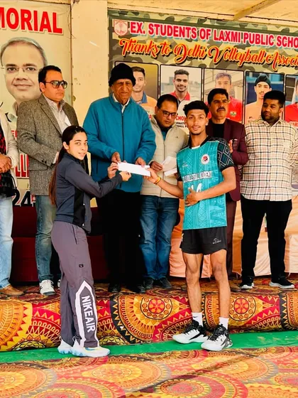 A player from our academy receiving a prize at a championship event. We encourage our players to compete in various tournaments to gain valuable match experience.