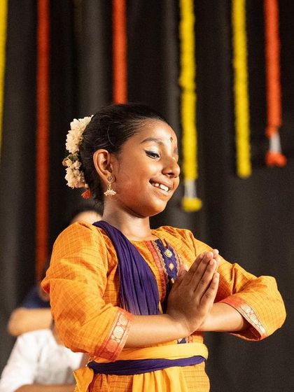 The joy on a young student's face during a performance is priceless. This is what we strive for in our classes, to nurture a love for dance that shines through on stage.