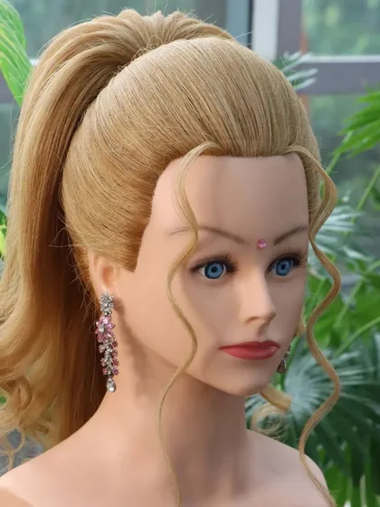 Another angle of the pop-out unicorn ponytail, showing its clean lines and voluminous feel. A great style for a chic and fashionable look.