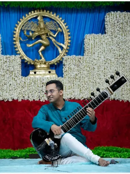 Another view of my performance in Kerala, showcasing the beautiful and traditional stage decor.