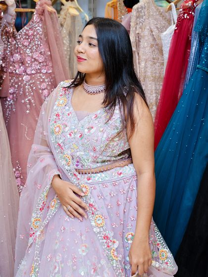 A closer look at a lavender lehenga with delicate floral embroidery, perfect for a spring wedding or daytime event.