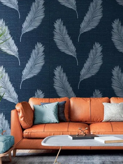 A bold and beautiful statement is made with this feather-themed wallpaper. The deep navy background contrasts with the delicate white feathers, creating a design that is both modern and timelessly elegant.