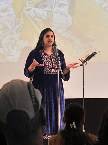 A performer sharing her powerful piece with the audience. The workshop helped poets refine their work for a live performance setting.
