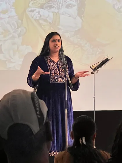 A performer sharing her powerful piece with the audience. The workshop helped poets refine their work for a live performance setting.