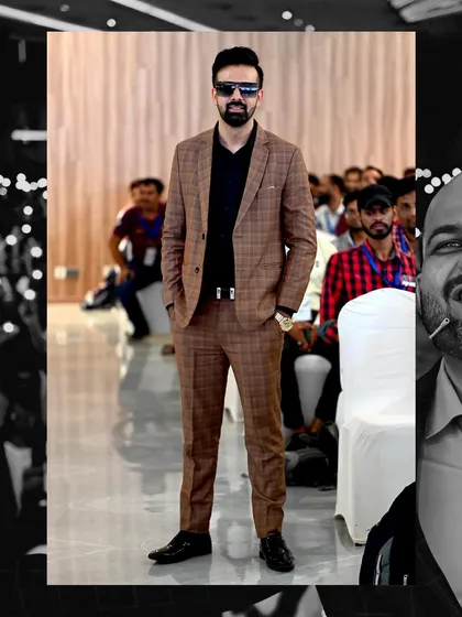 A full-length shot of me at the Ahmedabad event, showcasing my professional attire for the conference.