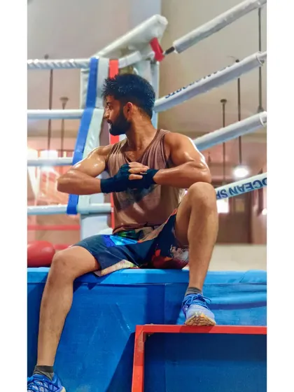 A quiet moment of reflection in the ring after a hard session. Sometimes you don't need a caption, the feeling says it all.