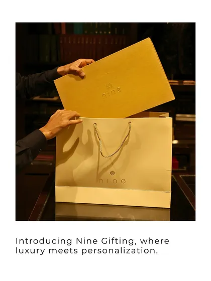 The final presentation matters. We carefully place each gift box into our elegant, branded carry bags, completing the luxury gifting experience from start to finish.