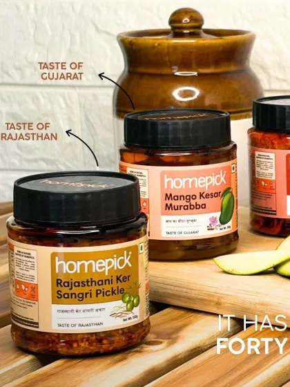 Explore the diverse tastes of India with our Rajasthani Ker Sangri Pickle and Gujarati Mango Kesar Murabba. Each jar is a journey to a different state, celebrating its unique culinary heritage.