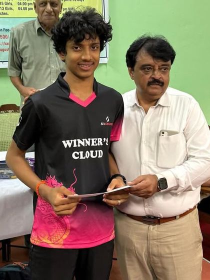 Abhinav K Murthy being recognized for his Runner-Up position in the Under 19 Boys singles category.