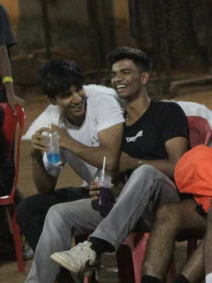 Players enjoying refreshments and a laugh between games. It's these moments that build lasting bonds.