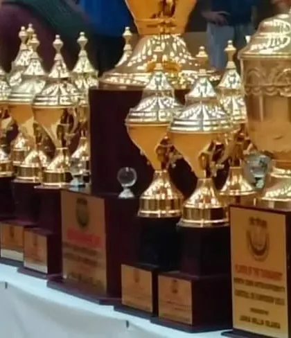 A display of the numerous trophies awarded during the North Zone Inter-University Basketball Championship. We manage all aspects of tournament awards, ensuring every winner and participant is recognized.