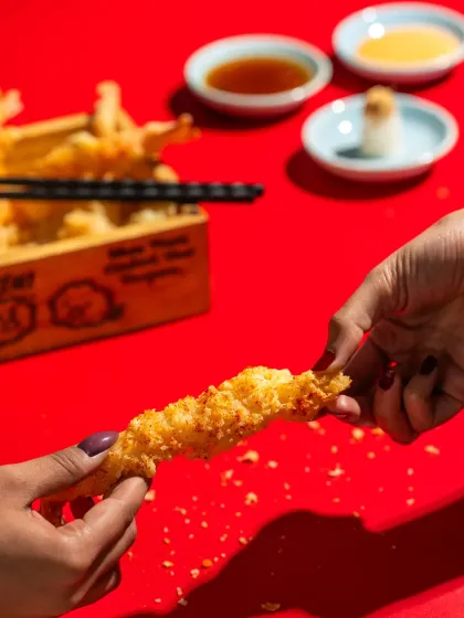 Another interactive shot with shrimp tempura for Harajuku Tokyo Cafe, focusing on the texture of the food.