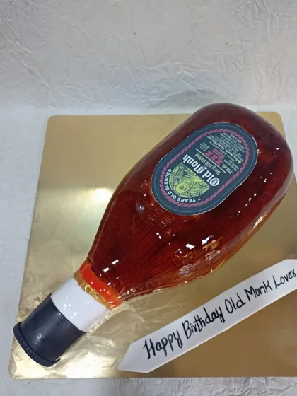 Can you believe this is a cake? I specialize in hyper-realistic designs like this Old Monk bottle cake, perfect for surprising someone with a truly unique and memorable sculpted dessert.