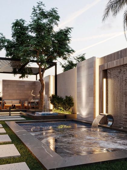 This backyard oasis features a stunning pool with a waterfall feature cascading from a modern, textured wall. The design also includes a separate water feature and a covered lounge area, creating multiple zones for relaxation.