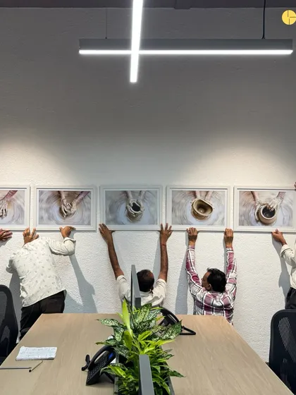 It takes a village. The final moments of a project handover involve a coordinated effort from our entire team of architects, designers, and contractors to ensure every artwork is perfectly placed.