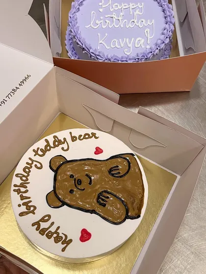 Small efforts go a long way. This cute bento cake features a hand-drawn teddy bear with the message "happy birthday teddy bear," showing how a personalized small cake can make a big impression.