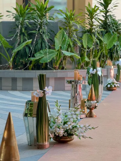 More angles from the super chic rooftop celebration in Mumbai. The decor combines modern elements with classic florals, all set against a stunning city skyline.