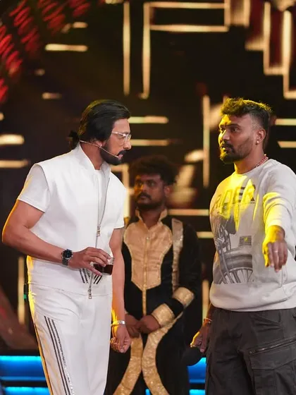 A candid moment discussing a sequence with Kiccha Sudeep sir on the set of Bigg Boss Season 10. Collaboration and clear communication with the artists are key to bringing the best performance to the screen.