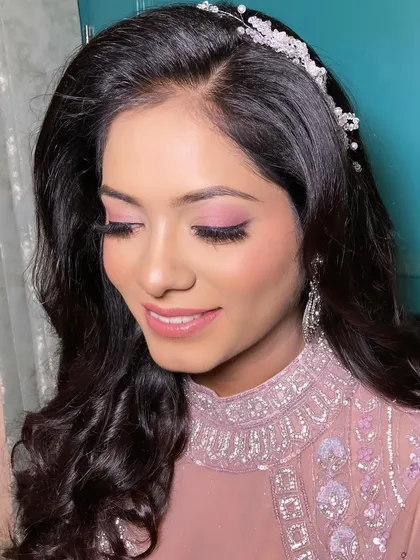 A soft engagement glam look for my bride Neha. The focus was on pink-toned eyeshadow and a natural, skin-like finish.
