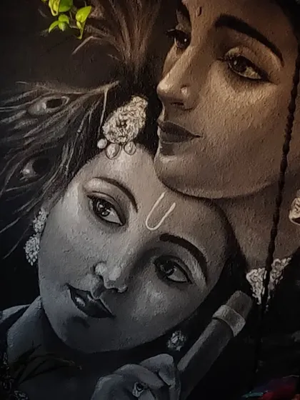 A detailed close-up of the finished mural. Notice the intricate work on the jewelry, the peacock feathers, and the expressive eyes of both figures.