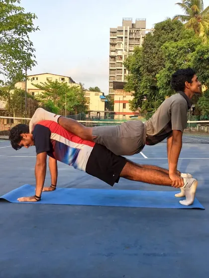 A creative and challenging partner exercise that builds core strength and stability for both players. We believe in making fitness engaging and functional.