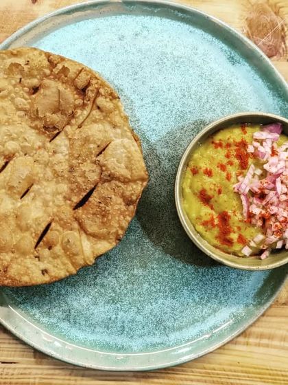 A personalized appetizer plate and bowl set, shown here with a delicious Sindhi dish. I am currently taking pre-orders for these versatile and customizable dinnerware pieces.