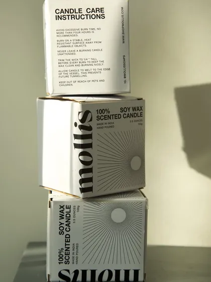 A stack of my 100% soy wax scented candle boxes.