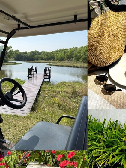 A view from a golf cart at a resort, looking out onto a wooden pier on the backwaters.