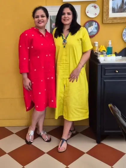 A photo from inside the cafe, showing how the yellow dress brightens up the space.