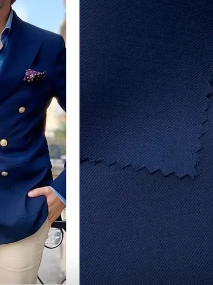 A style inspiration shot showing a navy double-breasted blazer paired with a denim shirt and beige trousers, next to a swatch of the blazer fabric.
