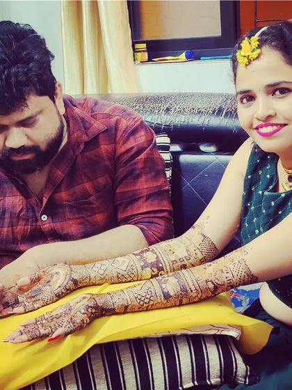 Posing with another satisfied bride. We take pride in making the mehndi experience memorable and delivering designs that exceed expectations.