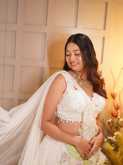 "Less makeup, more beauty." This engagement look is a testament to that philosophy, with a focus on fresh skin and a natural glow.