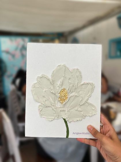 Another look at a beautifully crafted textured flower. The details in the center are made with delicate gold foil.