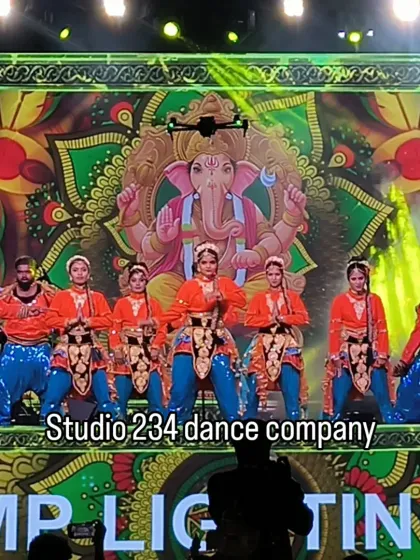 We begin many auspicious corporate events with a traditional Ganesh invocation. Our dancers, in vibrant orange and blue costumes, perform against a large LED screen displaying sacred imagery, setting a powerful and respectful tone for the evening.