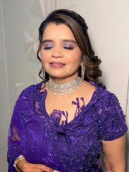 Another angle of the purple haze eyeshadow, showing how it catches the light. This look is perfect for anyone wanting to make a statement at a wedding or party.