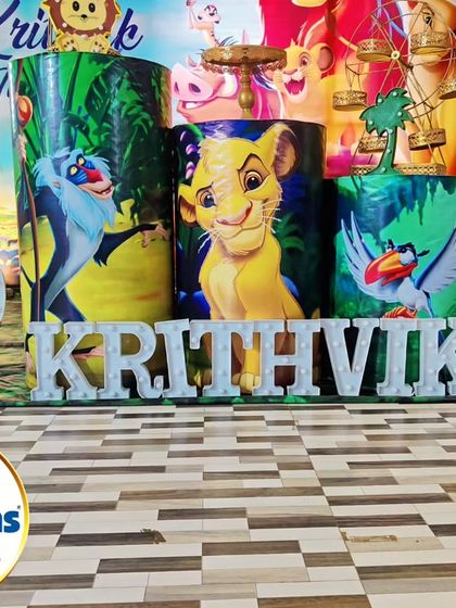 Detailed view of the custom-printed plinths for a Lion King party, featuring characters like Simba, Timon, and Zazu.