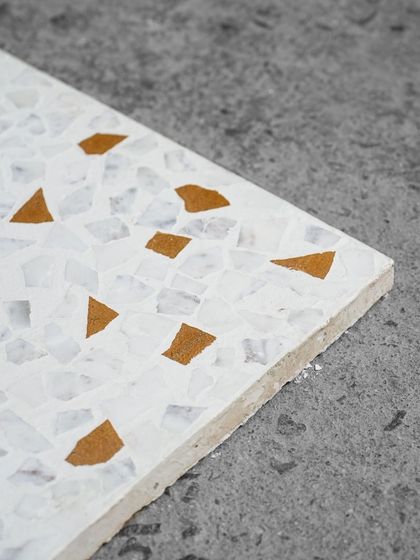 A profile view of a leather-finish tile, showing its thickness and the composition of the material.