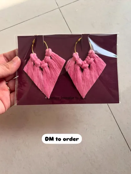 A lovely pair of pink macrame tassel earrings. This shade of pink is so soft and pretty, perfect for a feminine, boho style.