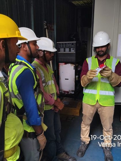 A technician demonstrates the proper use of insulated gloves and LOTO devices. Hands-on training ensures our team is proficient in using personal protective equipment (PPE) and safety tools correctly.
