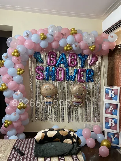 A straight-on view of the baby shower photo corner, ready for guests to capture memories. The combination of colors and textures makes it very photogenic.