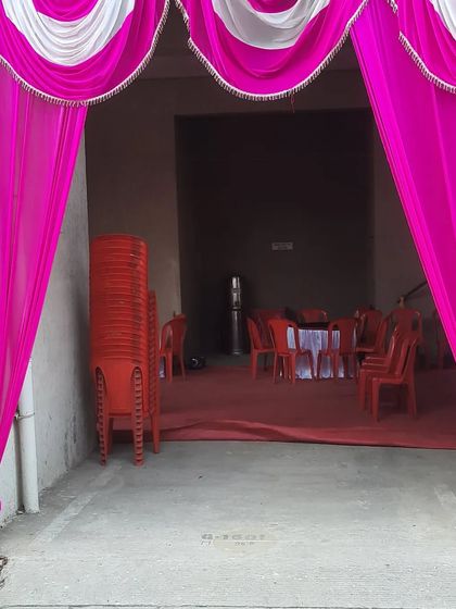 A stack of chairs ready to be set up, showing that I have enough inventory for large events.