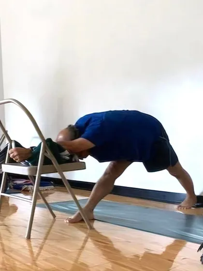 Ardha Chandrasana (Half Moon Pose) with a chair.