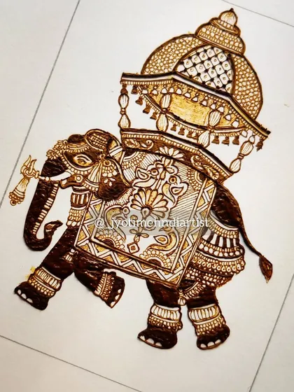 Learn to draw the majestic royal elephant, a symbol of prosperity in bridal mehndi. This design shows a highly decorated elephant with a seat, or howdah.