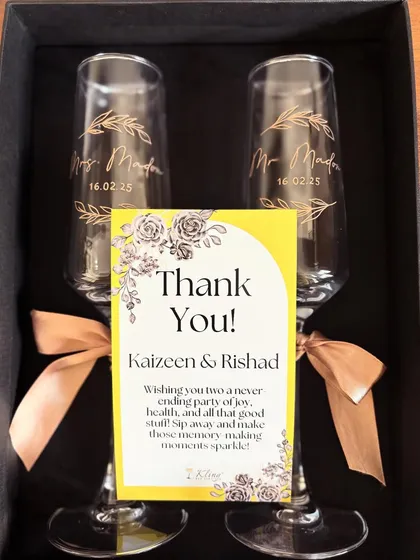 To celebrate the happy couple, we created these elegant, custom-etched champagne flutes. It's a beautiful keepsake for the bride and groom to remember their special day with every toast for years to come.