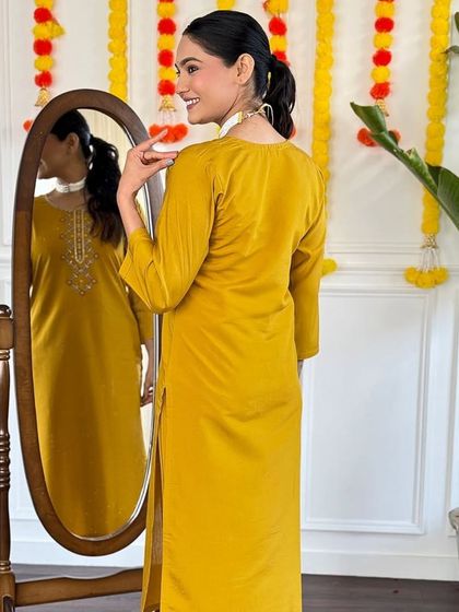 I love the combination of mustard and blue in this viscose chanderi kurta set. The printed dupatta is the star of this outfit.