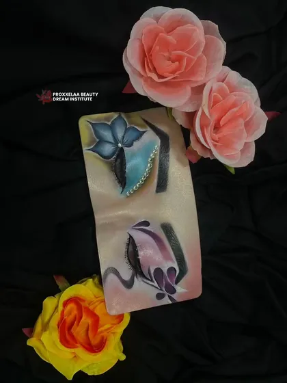 A different angle of the floral and butterfly eye makeup, highlighting the delicate line work and creative composition.