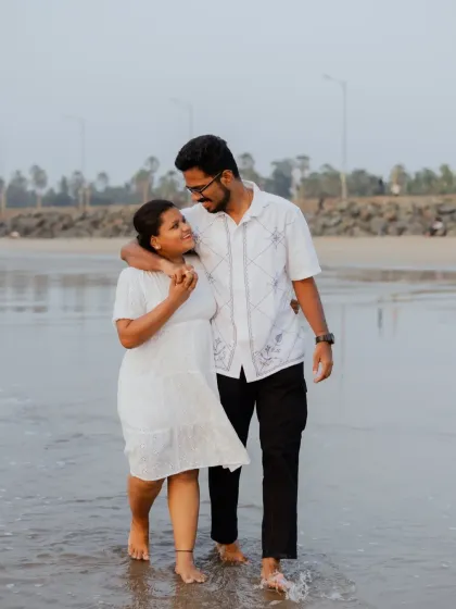 A candid walking shot of Hiresh and Apurva on the beach. I encourage couples to interact naturally, which results in authentic and joyful photos.
