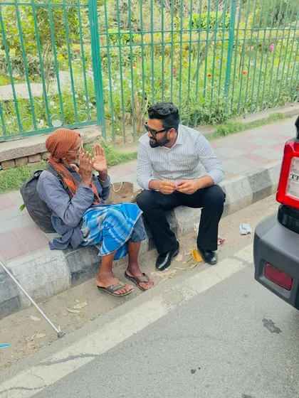 A moment of connection on a Delhi sidewalk. I believe true wealth lies not in riches, but in understanding the lives of the people, the very individuals we aim to serve.