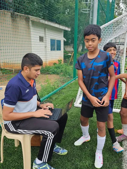 The registration and documentation process is a key part of our trials. Here, a young player gets registered by a staff member.
